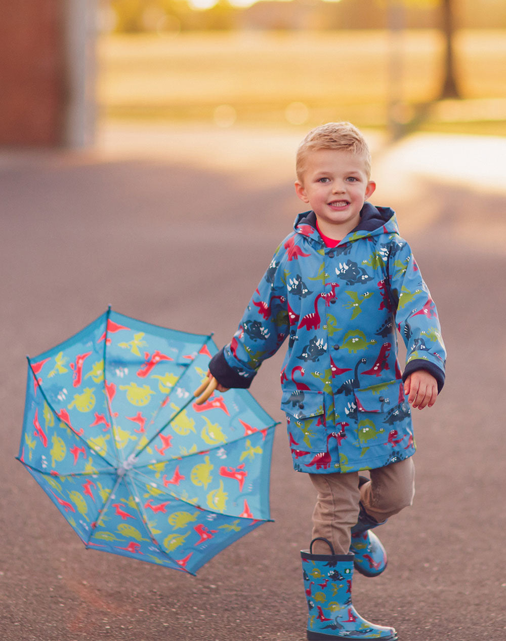 CLEARANCE: Blue Dinosaurs Lined Rain Jacket